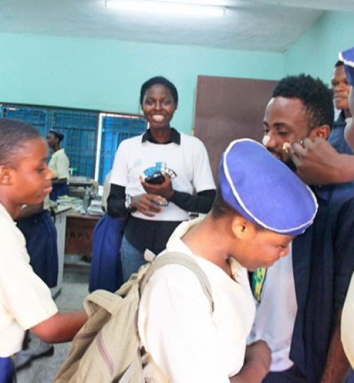 My face is painted with cake icing by a member of the Waste Rescue Club Photo: Retink Media